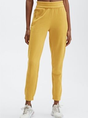 Fabletics Eco-Conscious Slim Sweatpant in Mustard